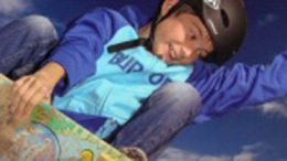 Kind auf Snowboard